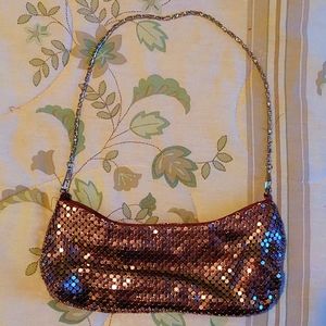 Metallic evening bag with strap